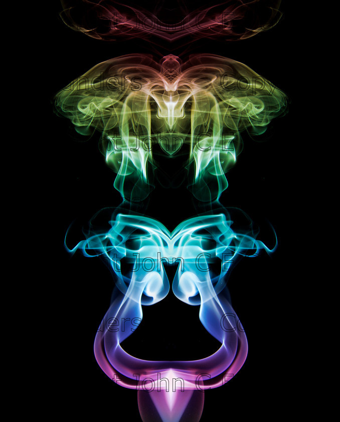 IMG 0861A 
 Coloured and symmetrical smoke art 
 Keywords: smoke,art,abstract,incense,wisp,fumes,zen,beauty,curve,isolated on black,pattern,black,white,grey,multicoloured,colourful,texture,colours,background,copy space,form,shape,symmetrical,symmetry,mysterious,eerie,translucent