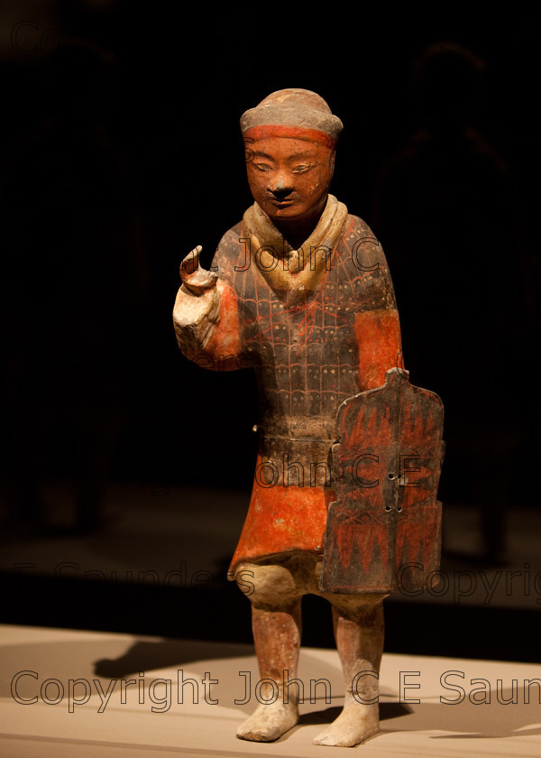 IMG 2736 
 Terracotta warrior clay statue from the Qin dynasty in China (220 - 206 BCE) 
 Keywords: Qin, ancient, art, brown, chinese, clay, culture, dark, dynasty, figure, head, history, red, sculpture, shadows, statue, terracotta, warrior