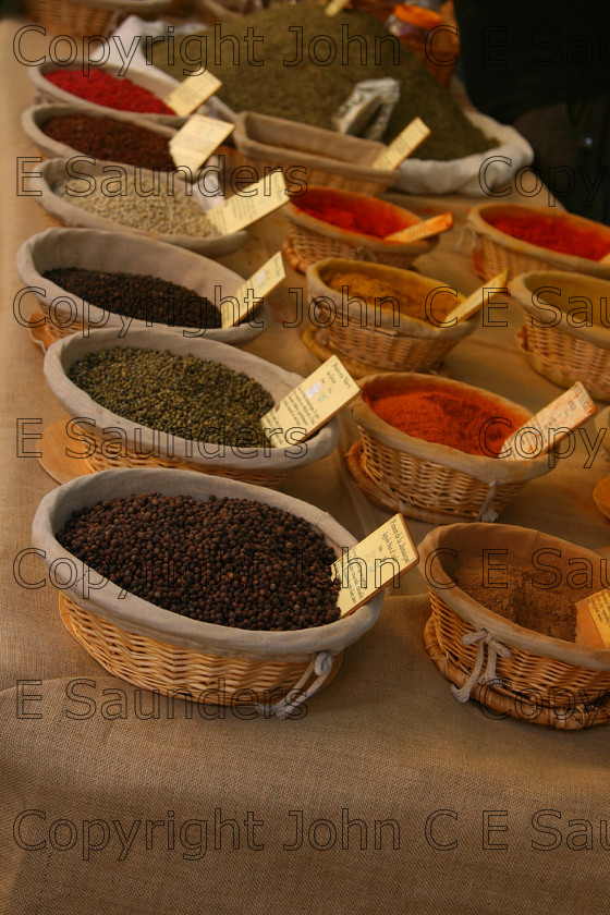 IMG 9295 
 Spices for sale 
 Keywords: spices,food,ingredients,bowls,France,market,red,brown,for sale