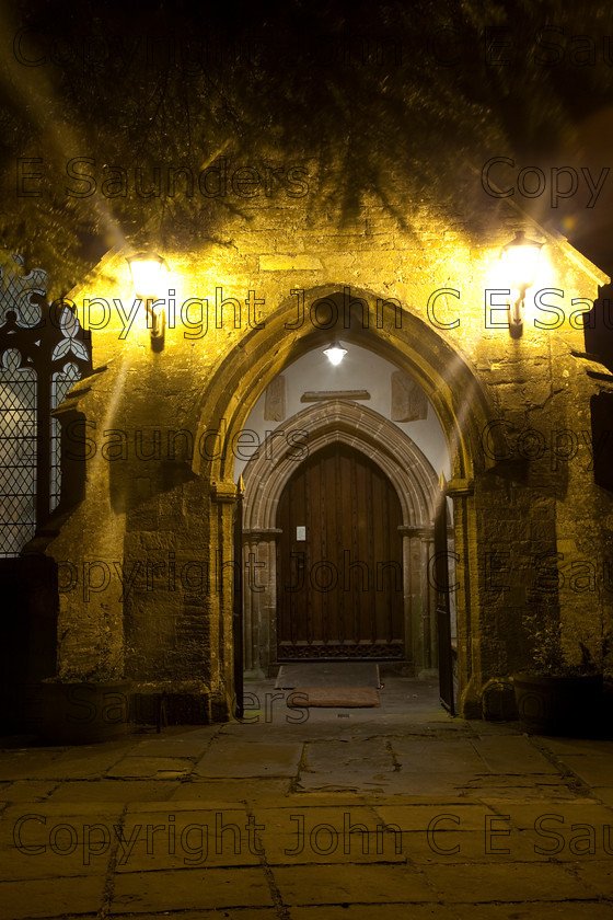 IMG 8417church door 
 Church door at night 
 Keywords: church,door,arch,UK,England,Saxon,religion,christian,lamp,night,dark,shadow