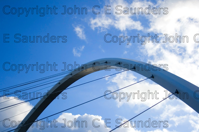IMG 4525 
 Newcastle Footbridge detail 
 Keywords: arch,sky,wires,cloud,blue,UK,England,Newcastle,footbridge
