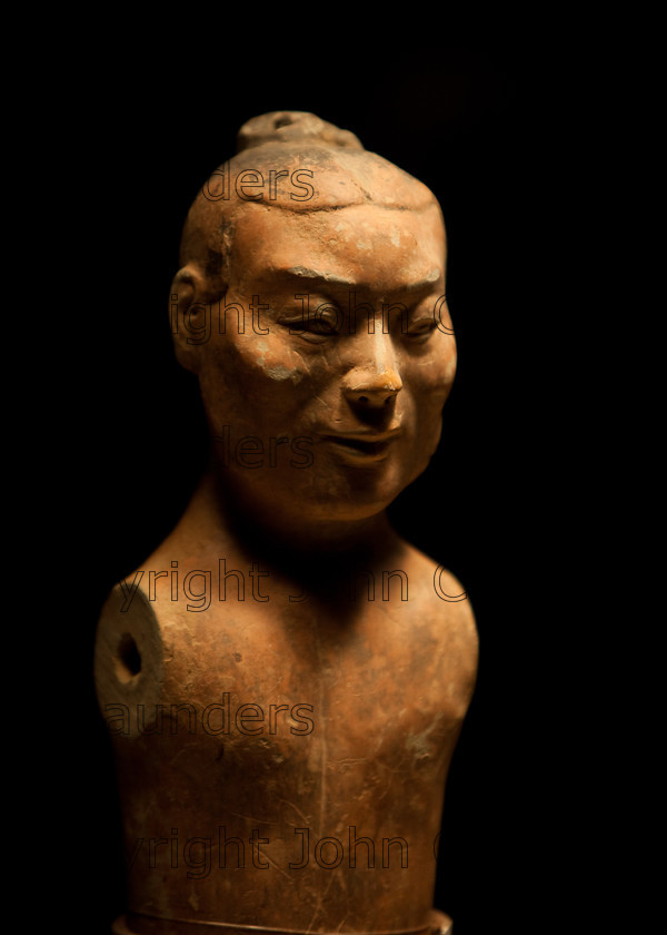 IMG 2740 
 Terracotta warrior clay statue from the Qin dynasty in China (220 - 206 BCE) 
 Keywords: Qin, ancient, art, brown, bust, chinese, clay, culture, dark, dynasty, head, history, sculpture, shadows, statue, terracotta, warrior
