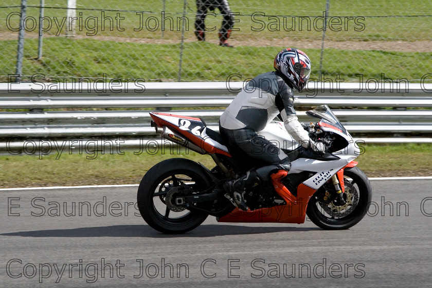 -6882 
 Racer 04 
 Keywords: motorcycle,motorbike,race track,racing,motorcyclist,motorsport,England,UK,Brands Hatch