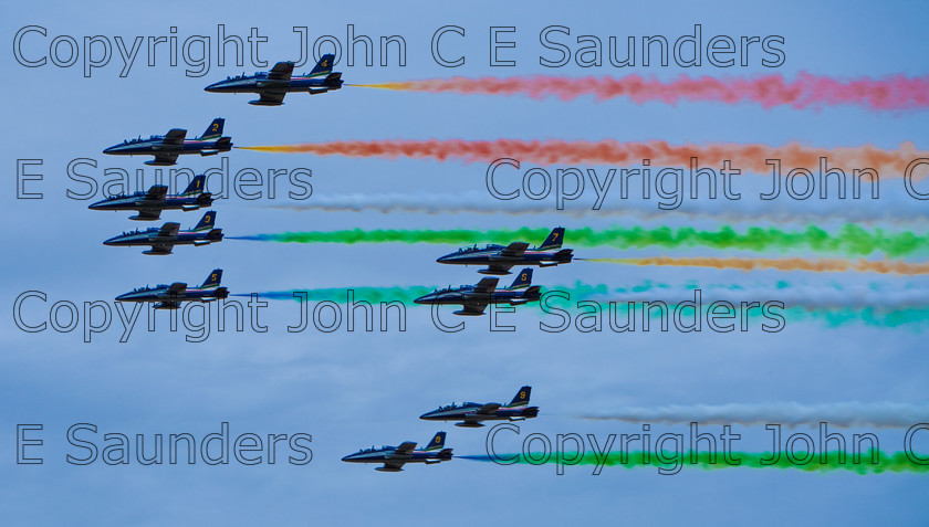 IMG 8290 
 Italian air display team 
 Keywords: aircraft,formation,aeroplane,flying,display,sky,blue,smoke,colours