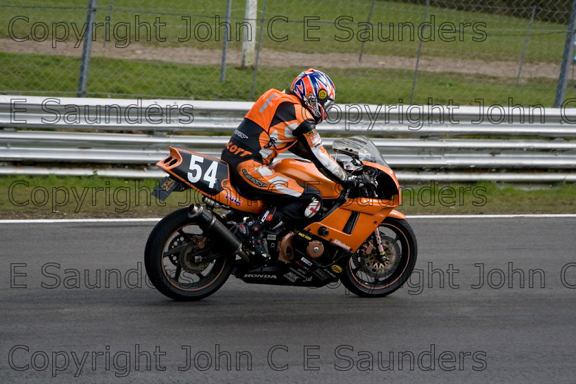 -6836 
 Racer 20 
 Keywords: motorcycle,motorbike,race track,racing,motorcyclist,motorsport,England,UK,Brands Hatch