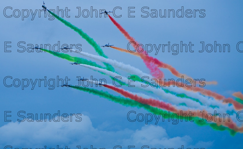 IMG 8285 
 Italian air display team 
 Keywords: aircraft,formation,aeroplane,flying,display,sky,blue,smoke,colours