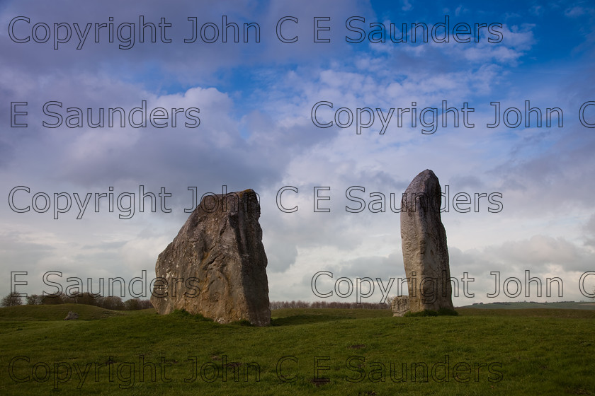 Avebury 
 Avebury stones 05 
 Keywords: Avebury,stones,rock,neolithic,prehistoric,Wiltshire,England,sandstone,sarsen stone,landscape,sky,blue,clouds