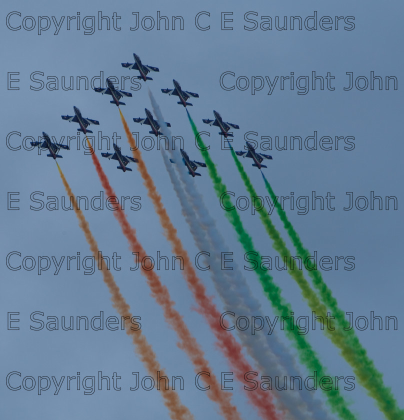 IMG 8244 
 Italian air display team 
 Keywords: aircraft,formation,aeroplane,flying,display,sky,blue,smoke,colours