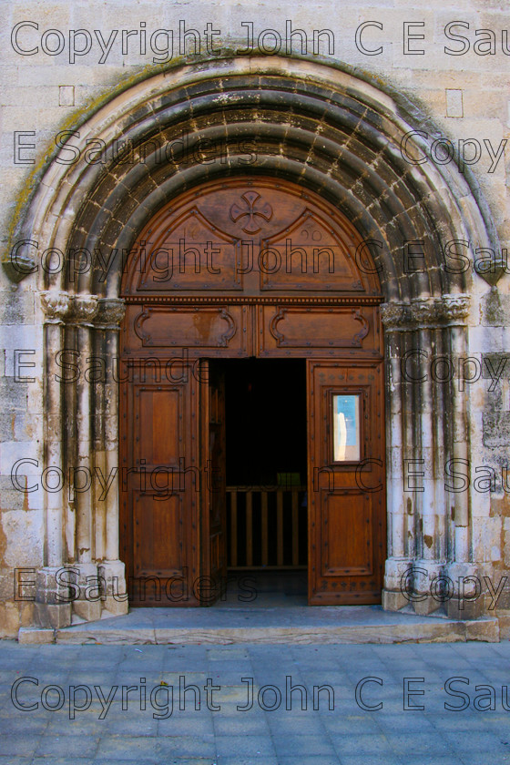 churchdoor 
 French Church door 
 Keywords: church,door,arch,wood,stone,France,Sault,Provence
