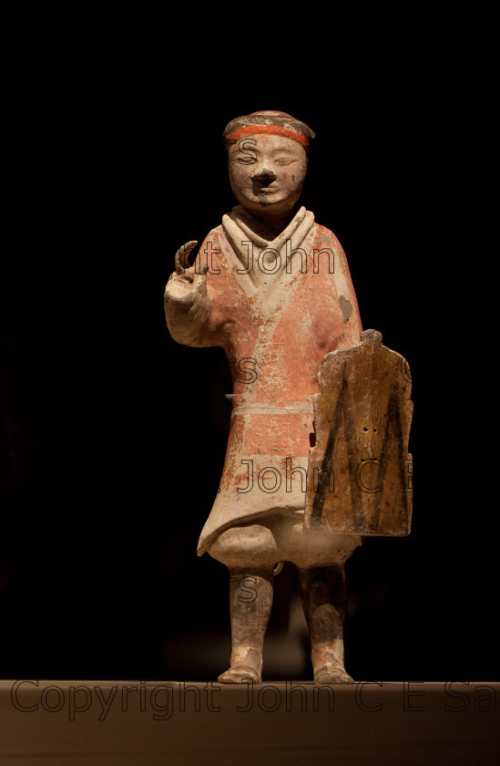 IMG 2737 
 Terracotta warrior clay statue from the Qin dynasty in China (220 - 206 BCE) 
 Keywords: Qin, ancient, art, brown, chinese, clay, culture, dark, dynasty, figure, head, history, red, sculpture, shadows, statue, terracotta, warrior