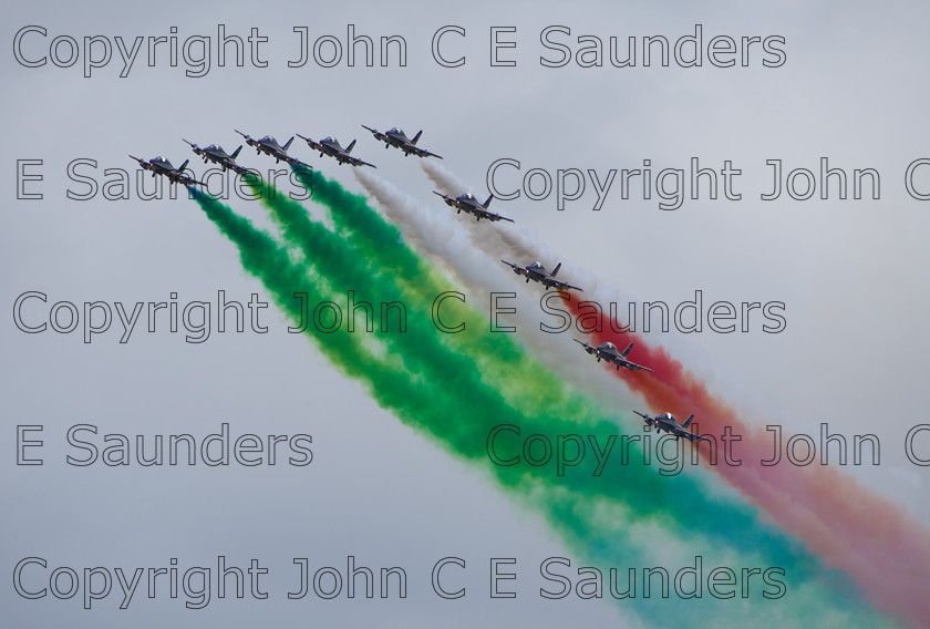 IMG 8305 
 Italian air display 
 Keywords: aircraft,formation,aeroplane,flying,display,sky,smoke,colours