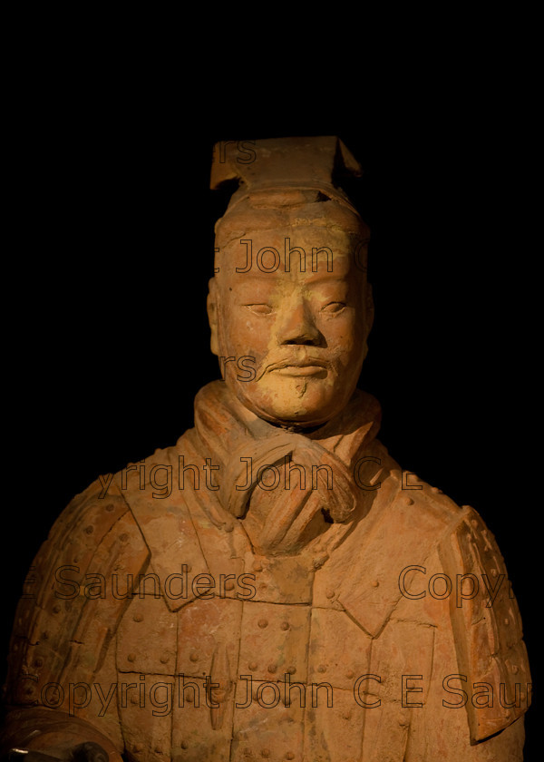 IMG 2729 
 Terracotta warrior clay statue detail from the Qin dynasty in China (220 - 206 BCE) 
 Keywords: Qin, ancient, art, brown, bust, chinese, clay, culture, dark, dynasty, head, history, sculpture, shadows, statue, terracotta, warrior