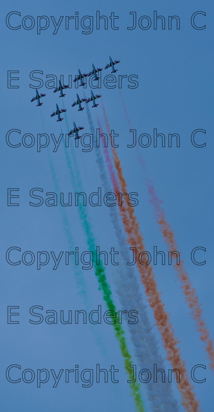 IMG 8279 
 Italian air display team in flight 
 Keywords: aircraft,formation,aeroplane,flying,display,sky,blue,smoke,colours