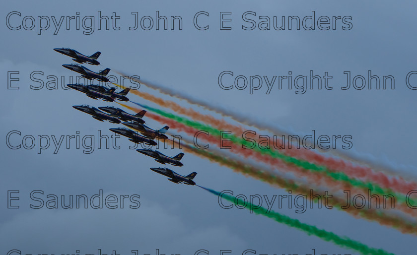 IMG 8241 
 Air display team 
 Keywords: aircraft,formation,aeroplane,flying,display,sky,blue,smoke,colours