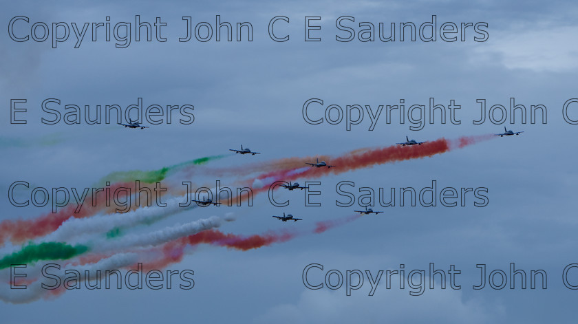 IMG 8260 
 Italian air display show 
 Keywords: aircraft,formation,aeroplane,flying,display,sky,blue,smoke,colours