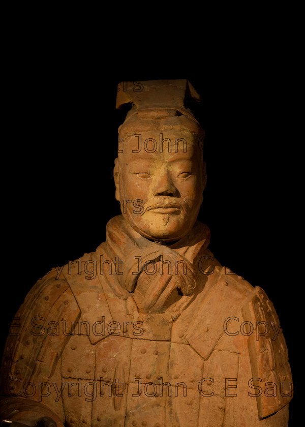 IMG 2728 
 Terracotta warrior clay statue detail from the Qin dynasty in China (220 - 206 BCE) 
 Keywords: Qin, ancient, art, brown, bust, chinese, clay, culture, dark, dynasty, head, history, sculpture, shadows, statue, terracotta, warrior