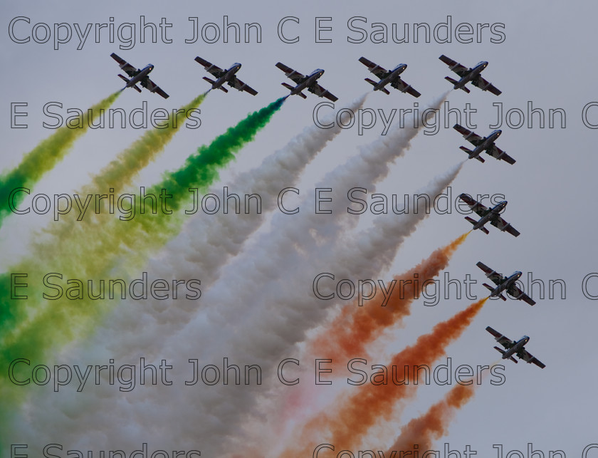 IMG 8310 
 Italian Air Force display 
 Keywords: aircraft,formation,aeroplane,flying,display,sky,smoke,colours