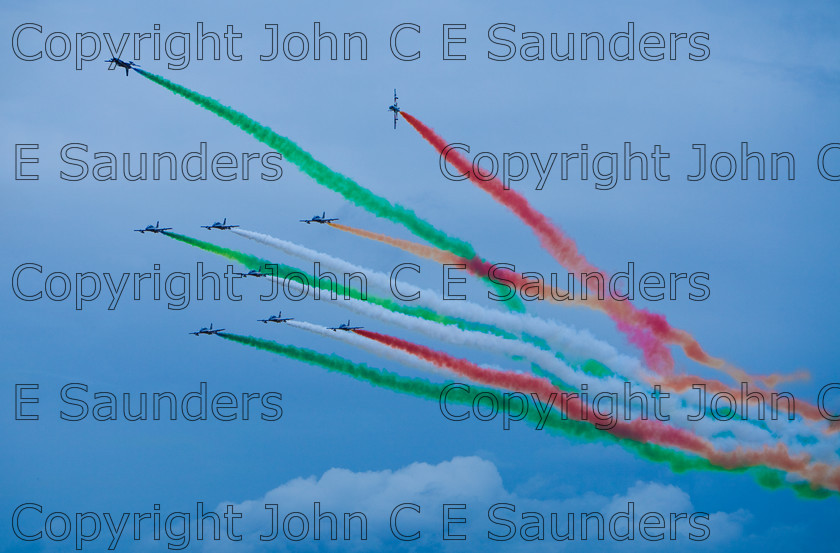IMG 8286 
 Italian air display team 
 Keywords: aircraft,formation,aeroplane,flying,display,sky,blue,smoke,colours