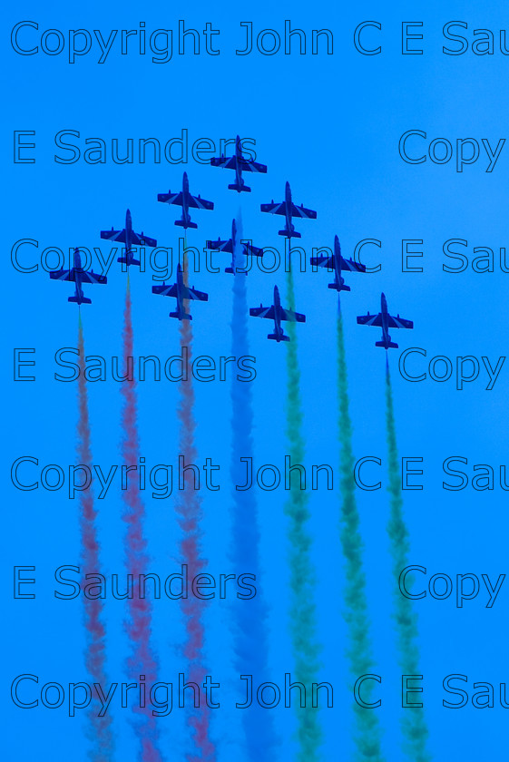 IMG 8245 
 Italian air display team 
 Keywords: aircraft,formation,aeroplane,flying,display,sky,blue,smoke,colours,creative