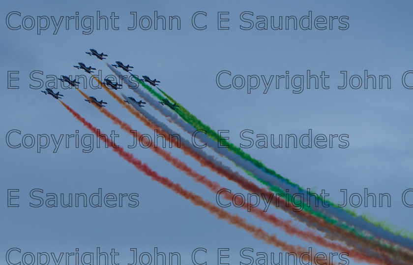 IMG 8243 
 Air display team 
 Keywords: aircraft,formation,aeroplane,flying,display,sky,blue,smoke,colours