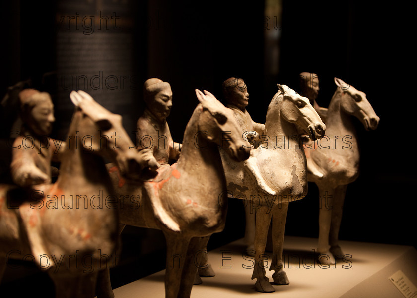 IMG 2734 
 Small terracotta horsemen from Qin dynasty in China (220 - 206 BCE), shallow depth of field 
 Keywords: Qin, ancient, art, brown, chinese, clay, culture, dark, dynasty, head, history, horsemen, horses, riders, sculpture, shadows, shallow depth of field, statue, terracotta, warriors