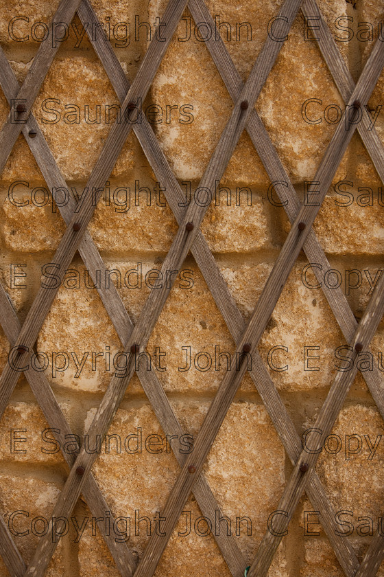 IMG 8625 
 Trellis 
 Keywords: trellis,wood,wall,stone,Cotswold stone,diamond shape,pattern,Cotswold,background