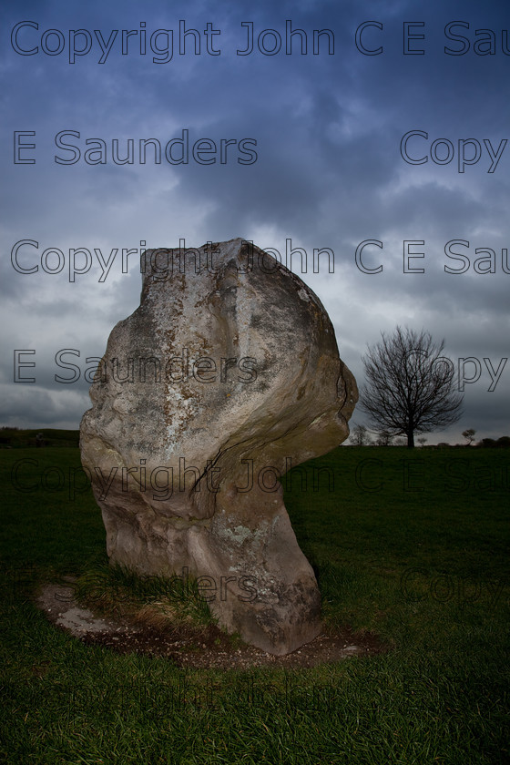 IMG 8761 
 Avebury stone 06 
 Keywords: Avebury,stone,rock,neolithic,prehistoric,Wiltshire,England,sandstone,sarsen stone,landscape,sky,cloud,blue
