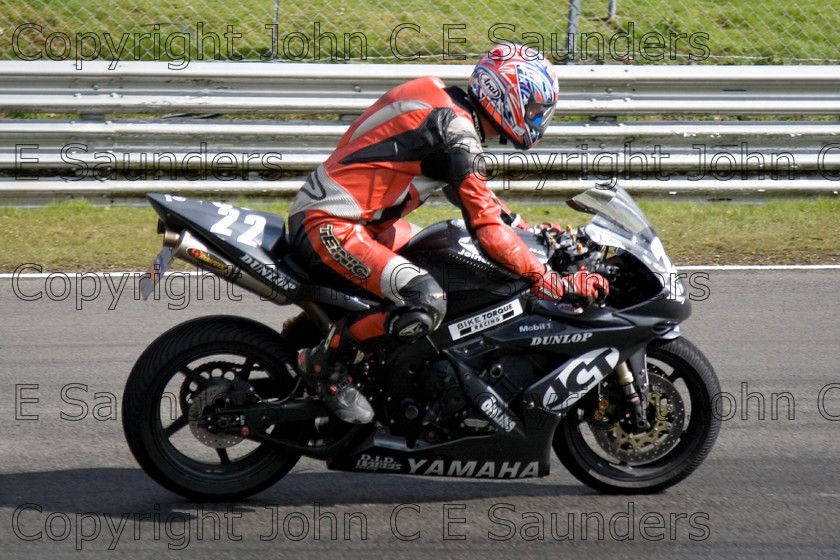 -6877 
 Racer 05 
 Keywords: motorcycle,motorbike,race track,racing,motorcyclist,motorsport,England,UK,Brands Hatch