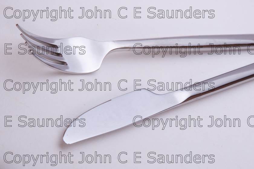 IMG 7800 
 Knife and fork 
 Keywords: knife,fork,cutlery,stainless steel,modern,isolated,white background