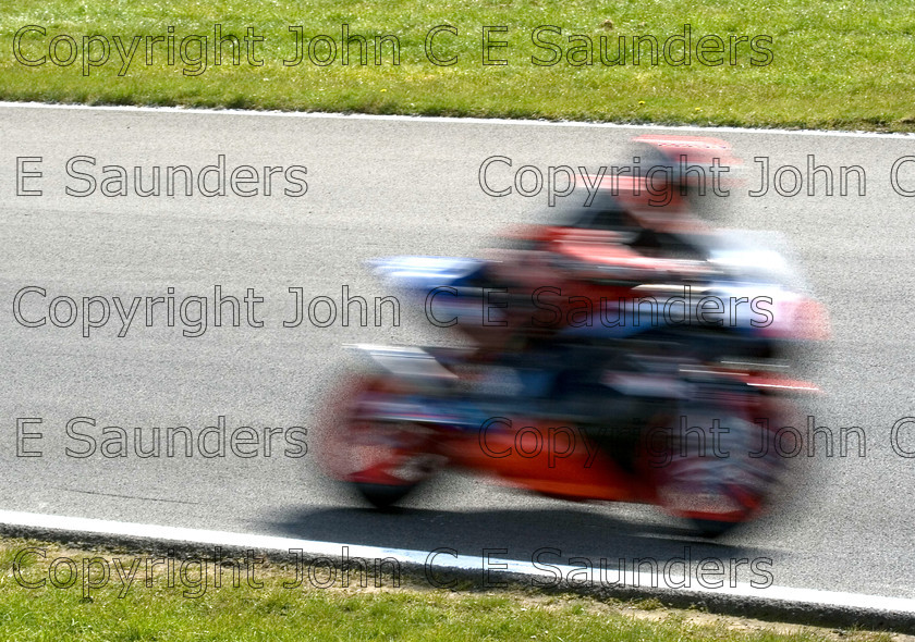 Speed 
 Speed 
 Keywords: motorcycle,racing,blur,racer,track,motion,speed,fast,motorbike,racing,red,white,blue,Brands Hatch,motorsport