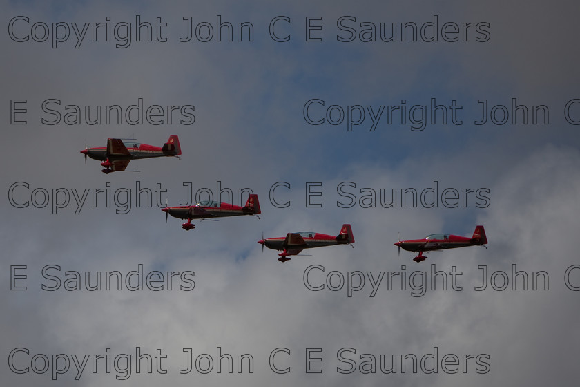 IMG 8402 
 Air display team in close flight 
 Keywords: aircraft,formation,aeroplane,flying,display,sky,blue,flight,clouds