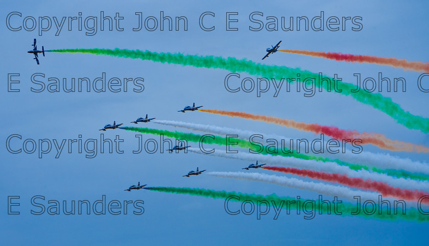 IMG 8287 
 Italian air display team performing 
 Keywords: aircraft,formation,aeroplane,flying,display,sky,blue,smoke,colours