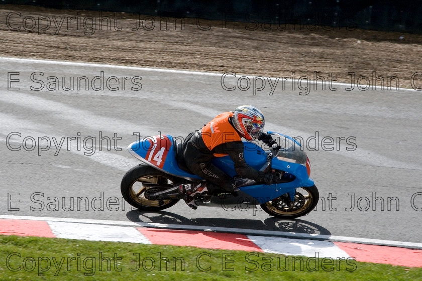 -6852 
 Racer 08 
 Keywords: motorcycle,motorbike,race track,racing,motorcyclist,motorsport,England,UK,Brands Hatch
