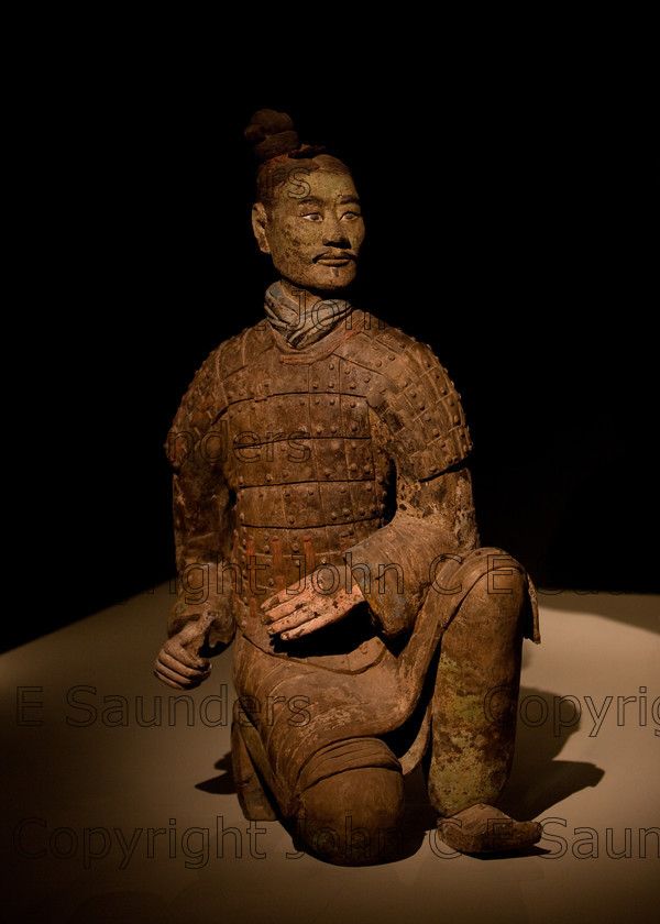 IMG 2726 
 Terracotta warrior clay statue from the Qin dynasty in China (220 - 206 BCE) 
 Keywords: Qin, ancient, art, brown, chinese, clay, culture, dark, dynasty, figure, head, history, sculpture, shadows, statue, terracotta, warrior