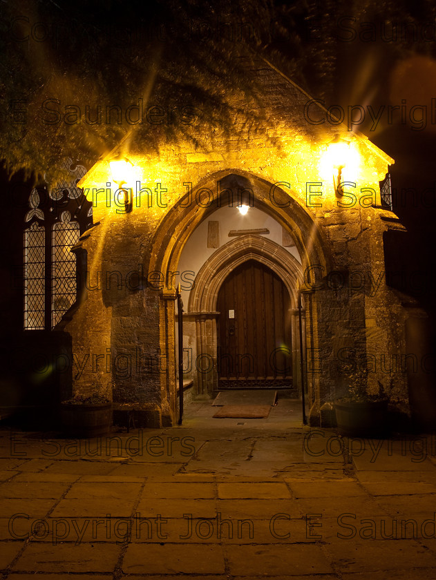 IMG 8416-Church-door01 
 Church doorway at night 
 Keywords: door,church,UK,England,entrance,arch,night,lamps,dark,religion,christian,shadows